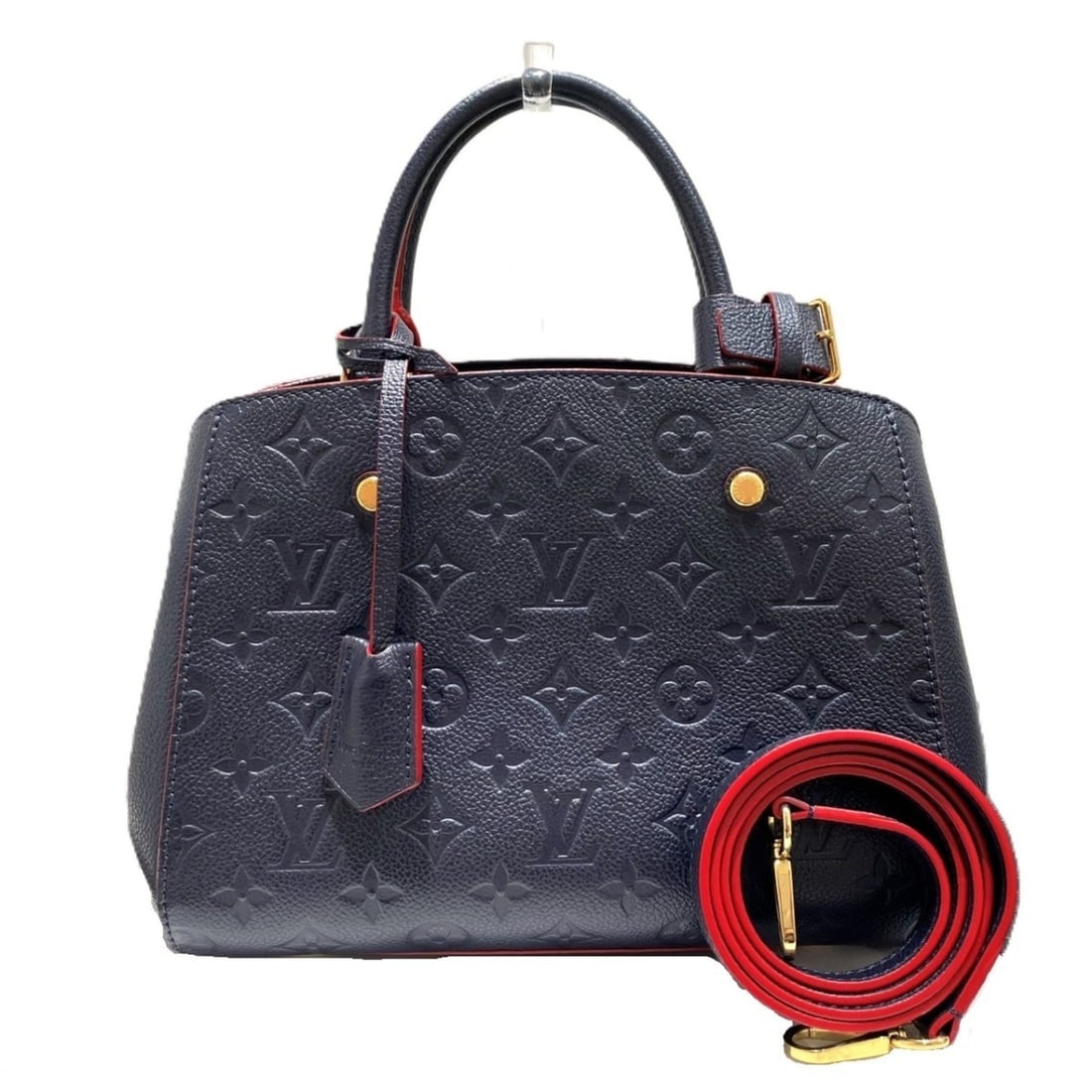 Louis Vuitton Montaigne BB Handbag, Monogram Empreinte Leather, M42747: --- Catalog ---Category: SizeSize (HxWxD): 20cm x 23.5cm x 10cm / 7.87'' x 9.25'' x 3.93''Category: DesignType: HandbagColor: Galle, Marine rouge, MonogramGender: WomenMaterial: Leather Category: