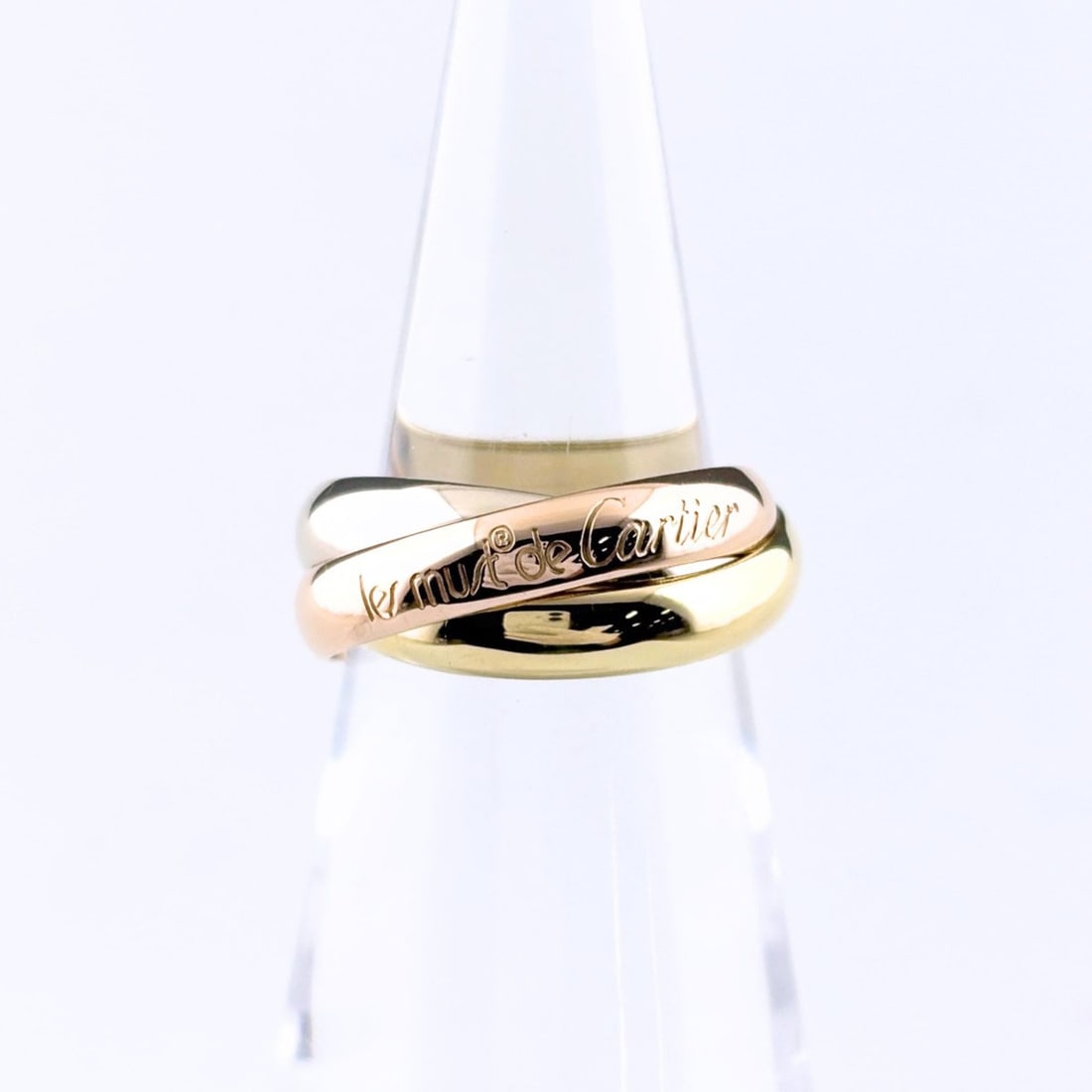 Cartier Trinity ring in yellow gold (YG), pink (PG), and white (WG). Three-color design. 750 gold.: --- Catalog ---Category: SizeJP Size: 8.5US Size: 4.5Category: DesignType: Band ringGender: WomenMaterial: Pink gold (18K), White gold (18K), Yellow gold (18K)Category: GeneralBrand: Cartier--- Item L