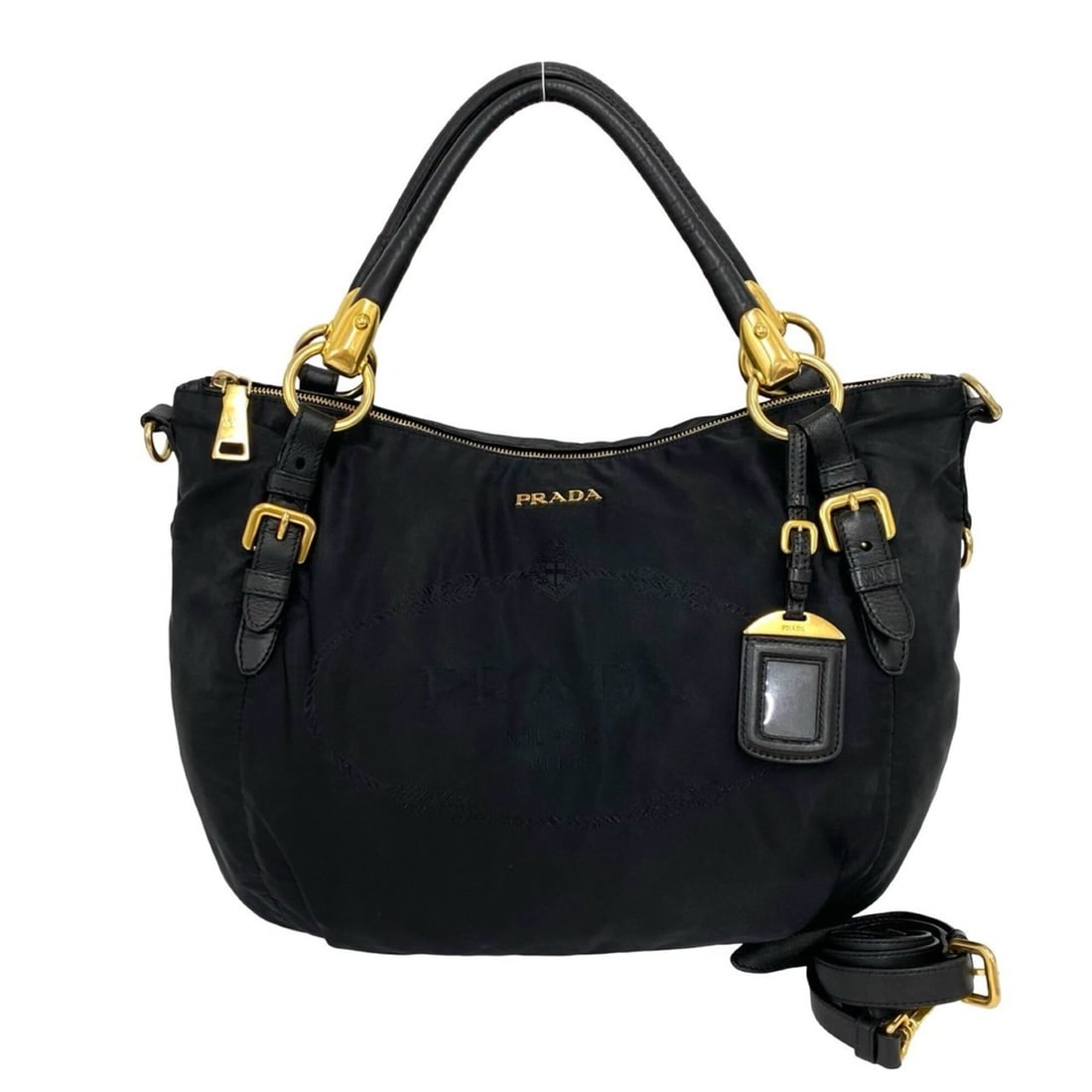 PRADA Prada Logo Hardware Tessuto Nylon Leather Genuine 2-way Shoulder Bag Handbag Tote Black 957-1: --- Catalog ---Category: SizeSize (HxWxD): 29cm x 40cm x 14.5cm / 11.41'' x 15.74'' x 5.7''Category: DesignType: Handbag, Shoulder bag, Tote bagColor: BlackGender: WomenMaterial: Nylon , Leather Categ