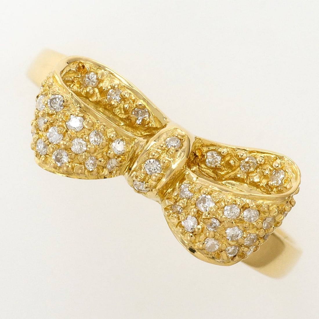 18K (18-karat) Yellow Gold Ring with 0.12ct Diamond, Total Weight 2.7g, Jewelry: --- Catalog ---Category: SizeWidth: 9mm / 0.35''Weight: 2.7g / 0.09oz.JP Size: 16US Size: 8Category: DesignType: Band ringColor: Yellow goldMetal: GoldStone: DiamondGender: WomenMaterial: Yellow gold 
