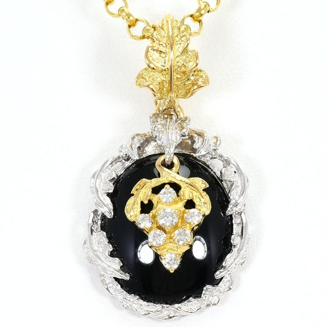 PT900 Platinum 18K Yellow Gold Necklace with Onyx and 0.15ct Diamond, Certificate of Authenticity: --- Catalog ---Category: SizeWeight: 9.5g / 0.33oz.Pendant Size: 32mm x 17mm / 1.25'' x 0.66''Neck Circumference: 50 cm / 19.68''Category: DesignColor: Black, Platinum, Yellow goldMetal: Gold, Platinu