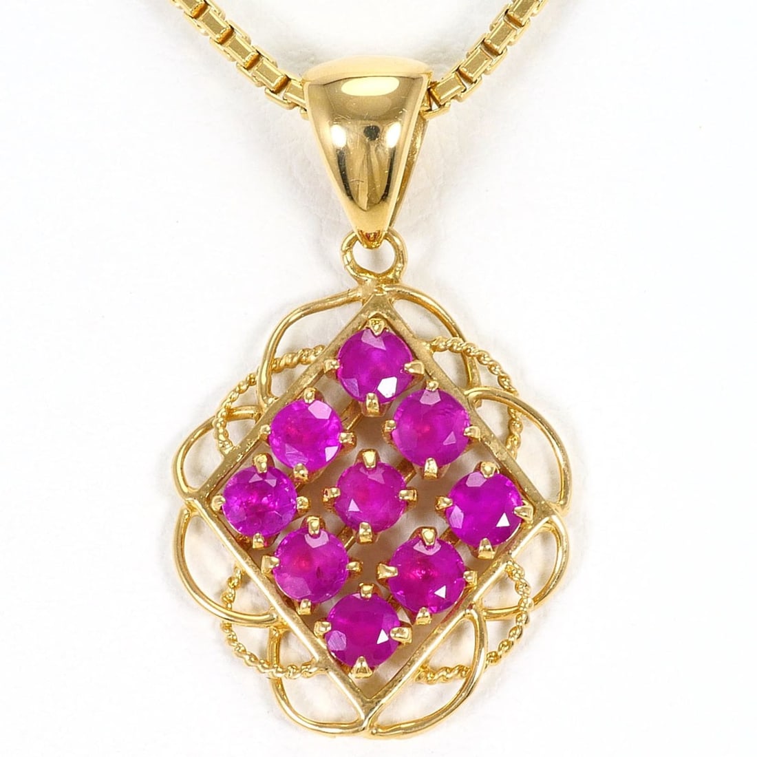 18K (18-karat) Yellow Gold Necklace with Ruby, Certificate of Authenticity, Total Weight 6.2g, 42cm: --- Catalog ---Category: SizeWeight: 6.2g / 0.21oz.Pendant Size: 23mm x 14mm / 0.9'' x 0.55''Neck Circumference: 42 cm / 16.53''Category: DesignColor: Yellow goldMetal: GoldStone: RubyGender: WomenMat