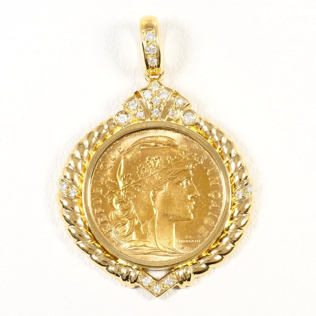 Marianne, France. 20 Francs. 18K Yellow Gold (K21.6K). Diamond pendant top with 0.19ct diamond. (1 of 20)