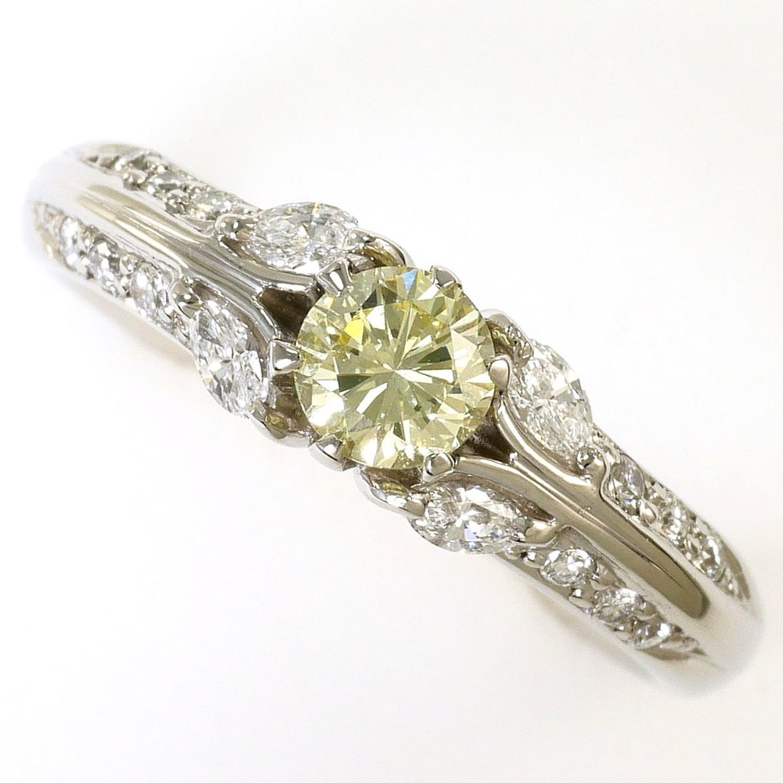 PT900 Platinum Ring with 0.317ct Yellow Diamond and 0.22ct (SI1 clarity, certified), Total Weight (1 of 12)
