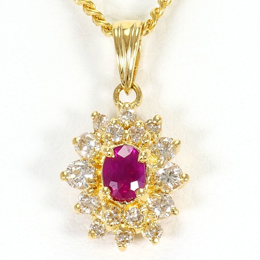 18K (18-karat) Yellow Gold Necklace with Ruby 0.25ct and Diamond 0.30ct, Certificate of: --- Catalog ---Category: SizeWeight: 4.4g / 0.15oz.Pendant Size: 18mm x 9mm / 0.7'' x 0.35''Neck Circumference: 41 cm / 16.14''Category: DesignColor: Yellow goldMetal: GoldStone: Diamond, RubyGender: 