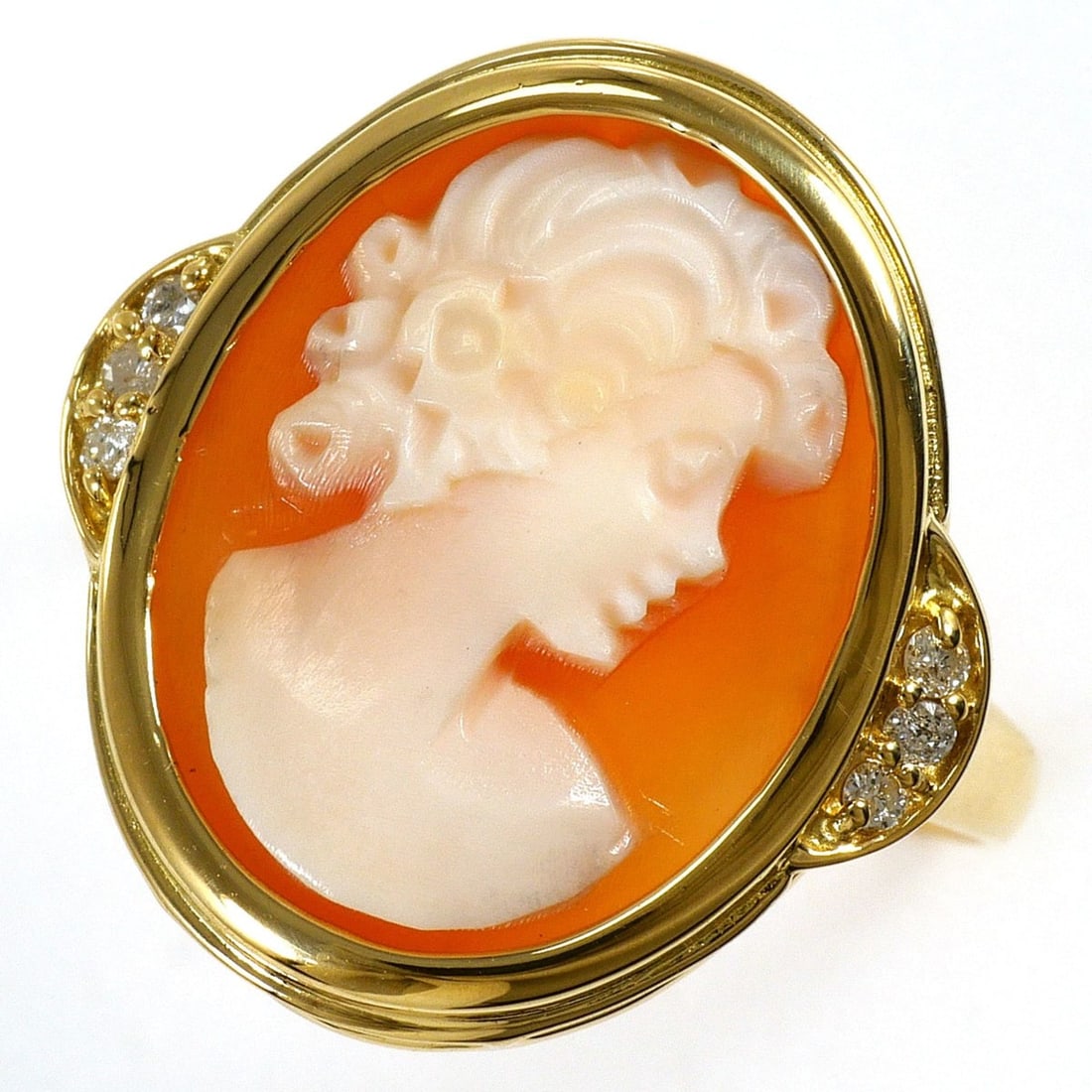 18K (18-karat) Yellow Gold Ring - 1 Shell Cameo with 0.05ct Diamond Total Weight 2.6g Jewelry: --- Catalog ---Category: SizeWidth: 18mm / 0.71''Weight: 2.6g / 0.09oz.JP Size: 11.5US Size: 6Category: DesignType: Band ringColor: Yellow goldMetal: GoldStone: DiamondGender: WomenMaterial: Yellow go
