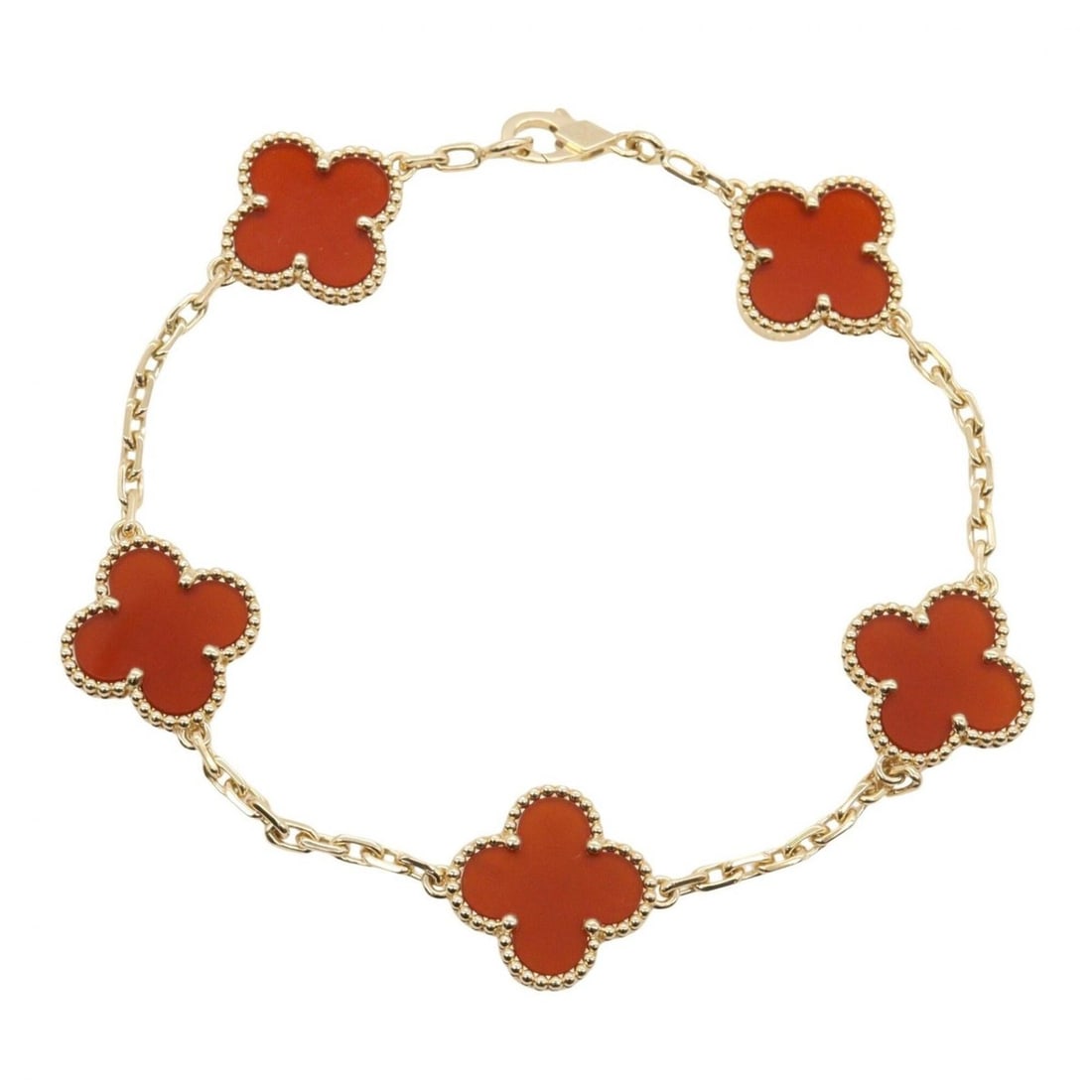 Van Cleef & Arpels Vintage Alhambra Carnelian 5-Motif Bracelet, 18K (Yellow Gold), Carnelian,: --- Catalog ---Category: SizeLength: 18cm / 7.08''Category: DesignType: Charm braceletColor: Gold, Red colorGender: WomenMaterial: Yellow gold (18K)Category: GeneralMPN: VCARD35500Brand: Van Cleef & A