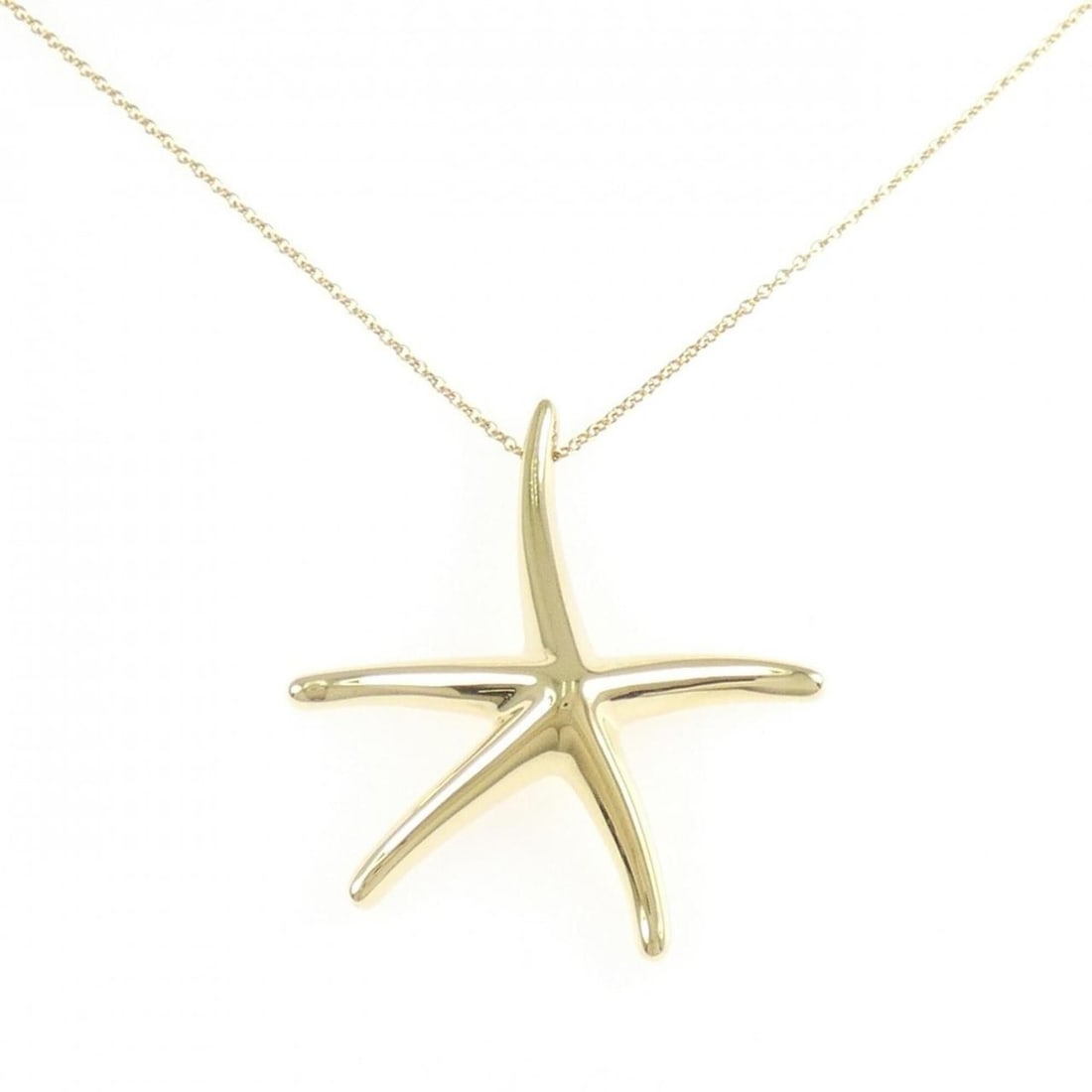 Tiffany Starfish Necklace: --- Catalog ---Category: SizePendant Size: 29.2mm x 35.7mm / 1.14'' x 1.4''Neck Circumference: 41 cm / 16.14''Category: DesignGender: WomenMaterial: Yellow gold (18K)Pendant Type: PendantNecklace