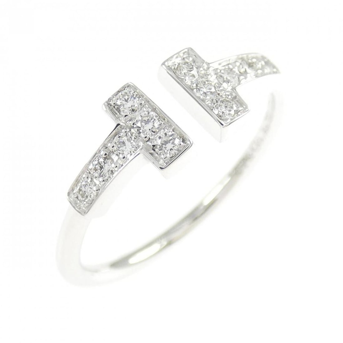 Tiffany T Wire Ring: --- Catalog ---Category: SizeJP Size: 11US Size: 6Category: DesignType: Band ringGender: WomenMaterial: White gold (18K)Category: GeneralBrand: Tiffany--- Item List ---Section: ConditionRanking: Rank