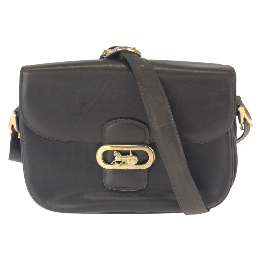 CELINE Vintage Horse Carriage Brown/Dark Brown Leather Shoulder Bag/Pouch for Women: --- Catalog ---Category: SizeSize (HxWxD): 17cm x 22cm x 7cm / 6.69'' x 8.66'' x 2.75''Category: DesignType: Pochette, Shoulder bagColor: Brown, Dark brownGender: WomenMaterial: Leather Category: Gene