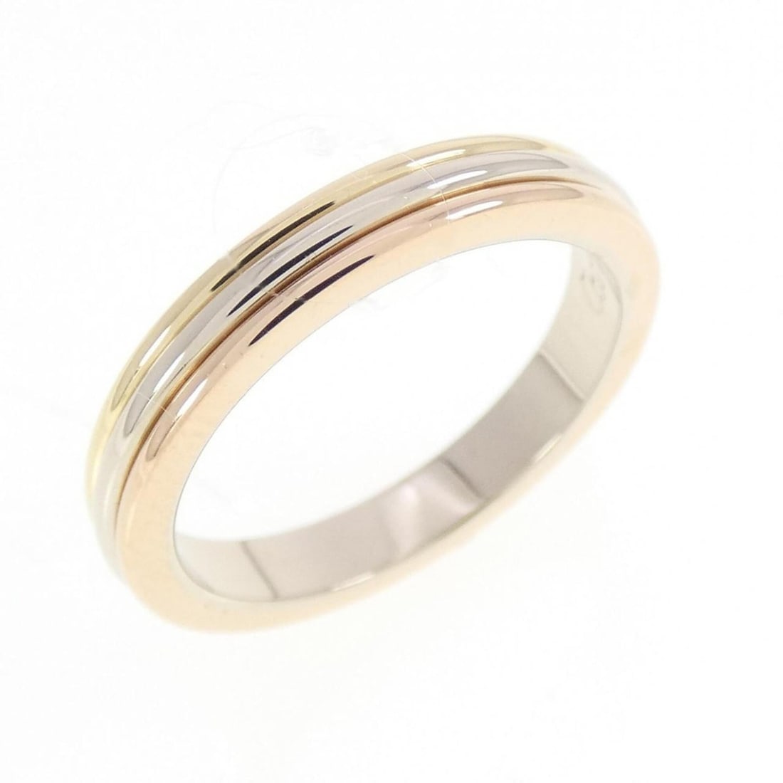 Cartier Three Gold Wedding Ring: --- Catalog ---Category: SizeJP Size: 6US Size: 3.5Category: DesignType: Wedding ringGender: WomenMaterial: Pink gold (18K), White gold (18K), Yellow gold (18K)Category: GeneralBrand: Cartier--- Item