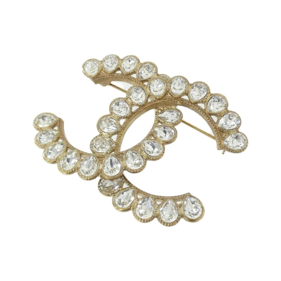 Chanel brooch: --- Catalog ---Category: SizeSize (HxWxD): 4.3cm x 5.5cm / 1.69'' x 2.16''Category: DesignType: BroochColor: Clear, GoldGender: WomenCategory: GeneralBrand: Chanel--- Item List ---Section:
