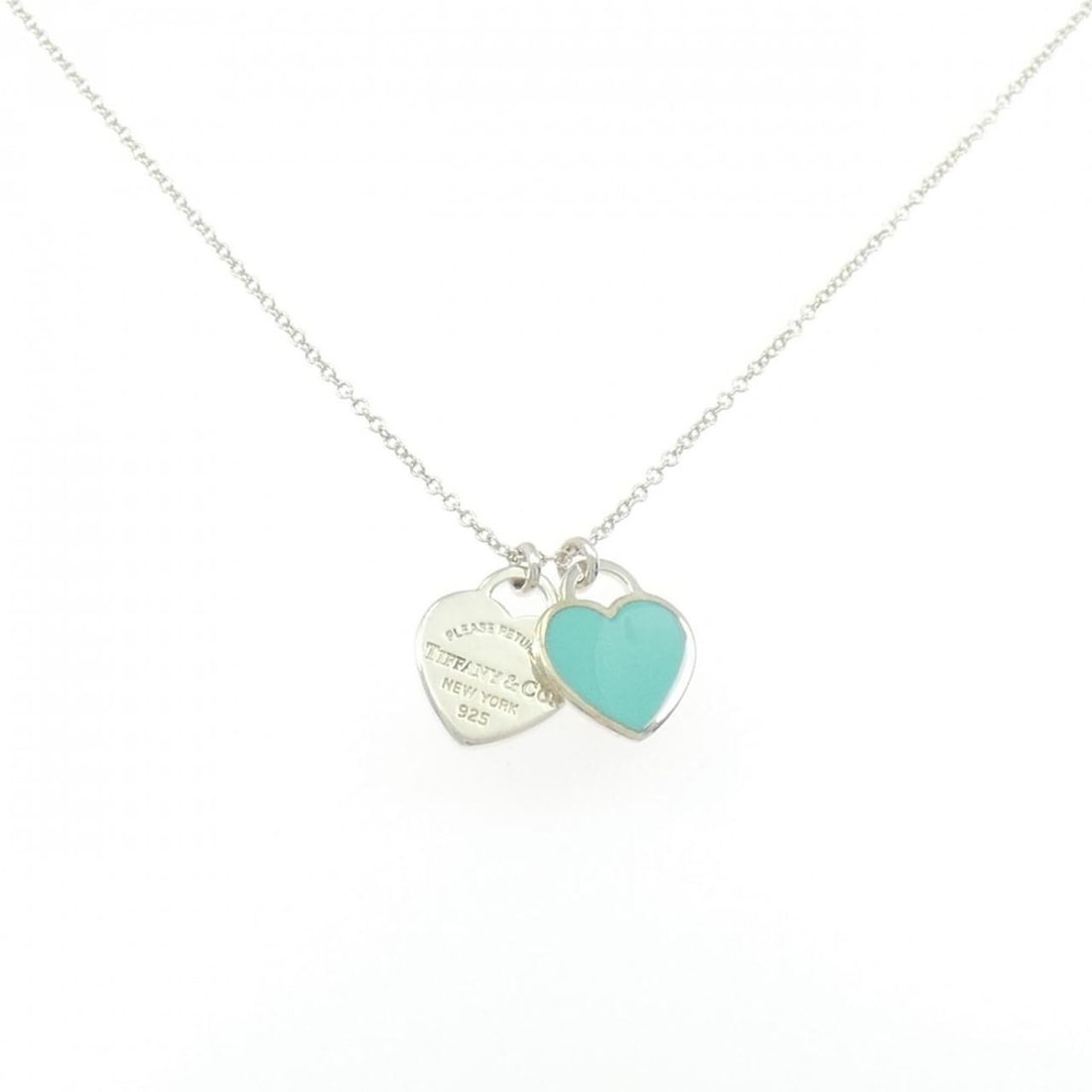 Tiffany & Co. Return to Mini Double Heart Tag Necklace: --- Catalog ---Category: SizePendant Size: 13.6mm x 10mm / 0.53'' x 0.39''Neck Circumference: 41 cm / 16.14''Category: DesignGender: WomenMaterial: Silver 925Pendant Type: PendantNecklace Type: