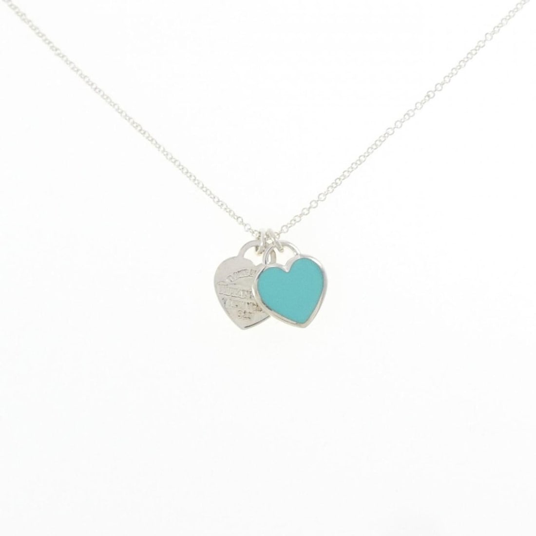 Tiffany & Co. Return to Mini Double Heart Tag Necklace: --- Catalog ---Category: SizePendant Size: 14mm x 12.4mm / 0.55'' x 0.48''Neck Circumference: 41 cm / 16.14''Category: DesignGender: WomenMaterial: Silver 925Pendant Type: PendantNecklace Type: