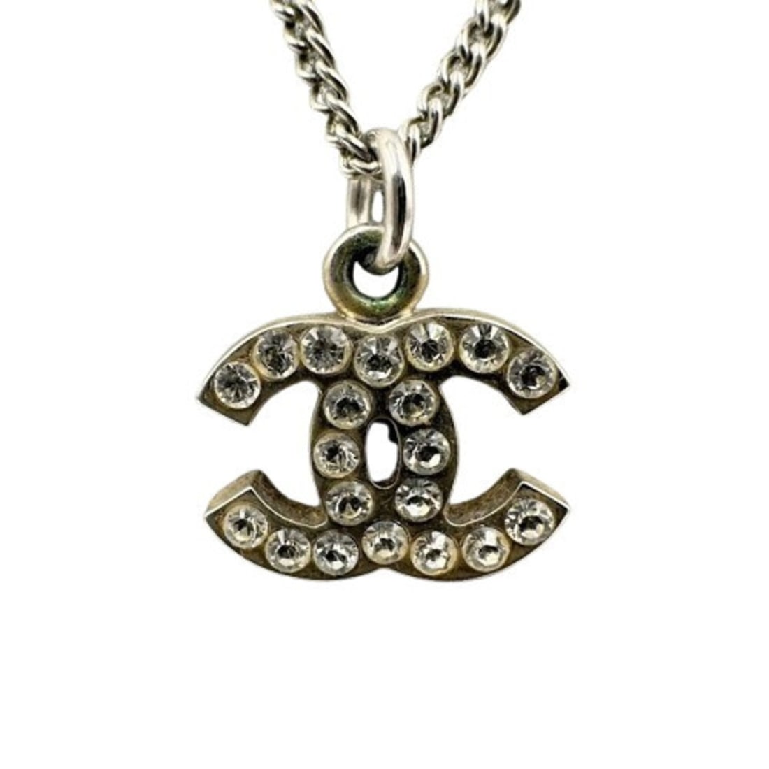 CHANEL Rhinestone Necklace 05V: --- Catalog ---Category: SizePendant Size: 10mm x 15mm / 0.39'' x 0.59''Neck Circumference: 43.5 cm / 17.12''Category: DesignColor: SilverStone: RhinestoneGender: WomenMaterial: MetalNecklace Type: