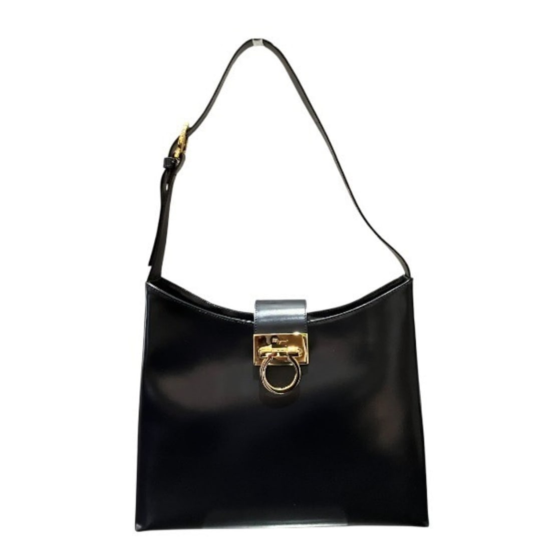 Salvatore Ferragamo Ferragamo Gancini Black Leather Shoulder Bag for Women: --- Catalog ---Category: SizeSize (HxWxD): 26cm x 30.5cm x 7cm / 10.23'' x 12'' x 2.75''Category: DesignType: Shoulder bagColor: BlackGender: WomenMaterial: Leather Category: GeneralBrand: Salvatore F