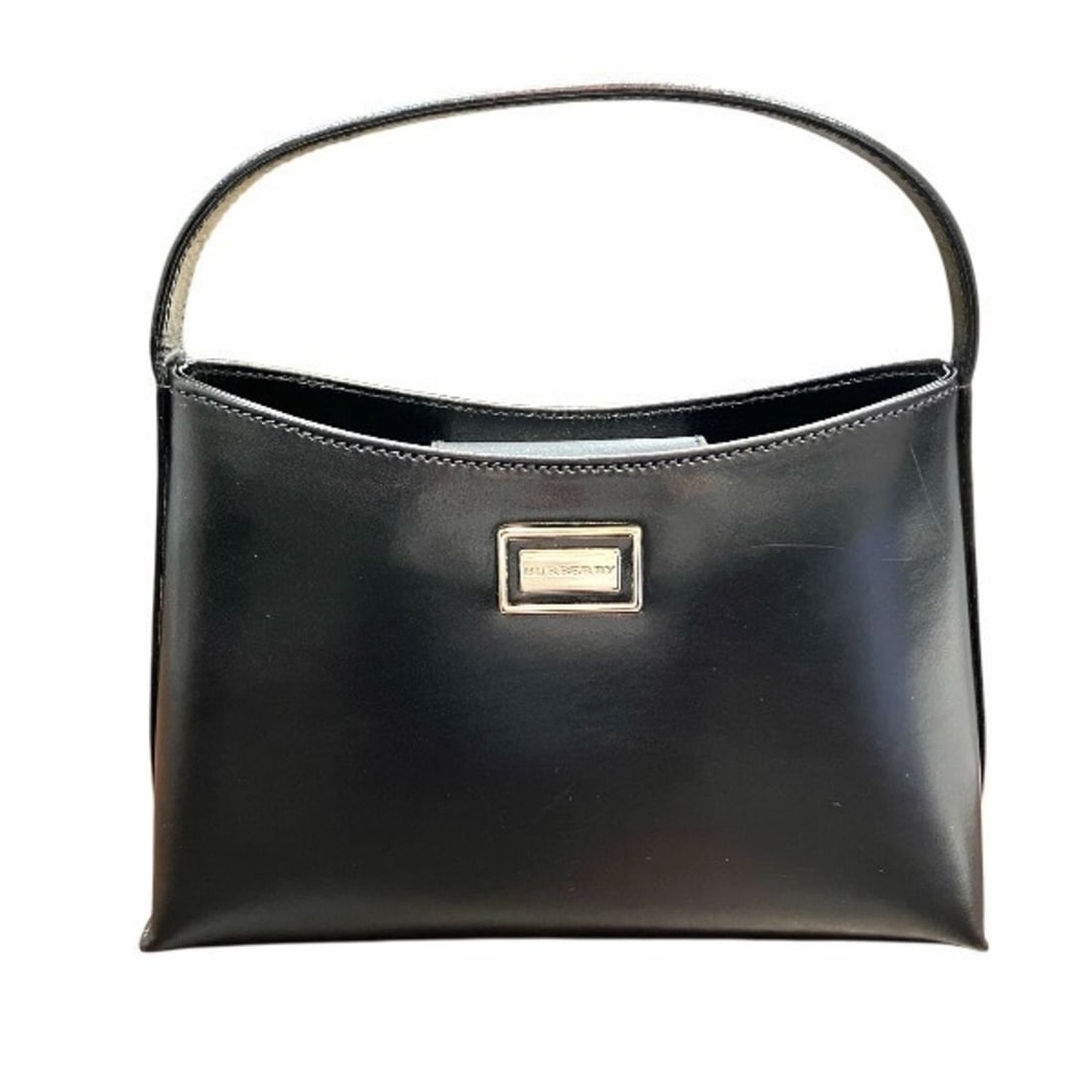 Burberry London Black Leather Handbag for Women: --- Catalog ---Category: SizeSize (HxWxD): 13cm x 22cm x 7cm / 5.11'' x 8.66'' x 2.75''Category: DesignType: HandbagColor: BlackGender: WomenMaterial: Leather Category: GeneralBrand: Burberry--- Item 