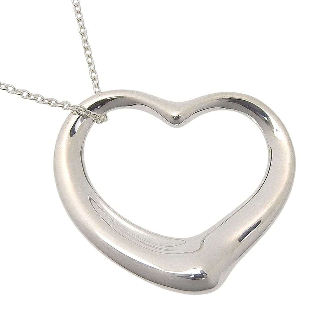 Tiffany & Co. Open Heart Large Long Necklace by Elsa Peretti, Sterling Silver 925, Approx. 14g, for: --- Catalog ---Category: SizePendant Size: 33mm x 35mm / 1.29'' x 1.37''Neck Circumference: 77.4 cm / 30.47''Category: DesignGender: WomenMaterial: Silver 925Necklace Type: NecklaceCategory: GeneralBr