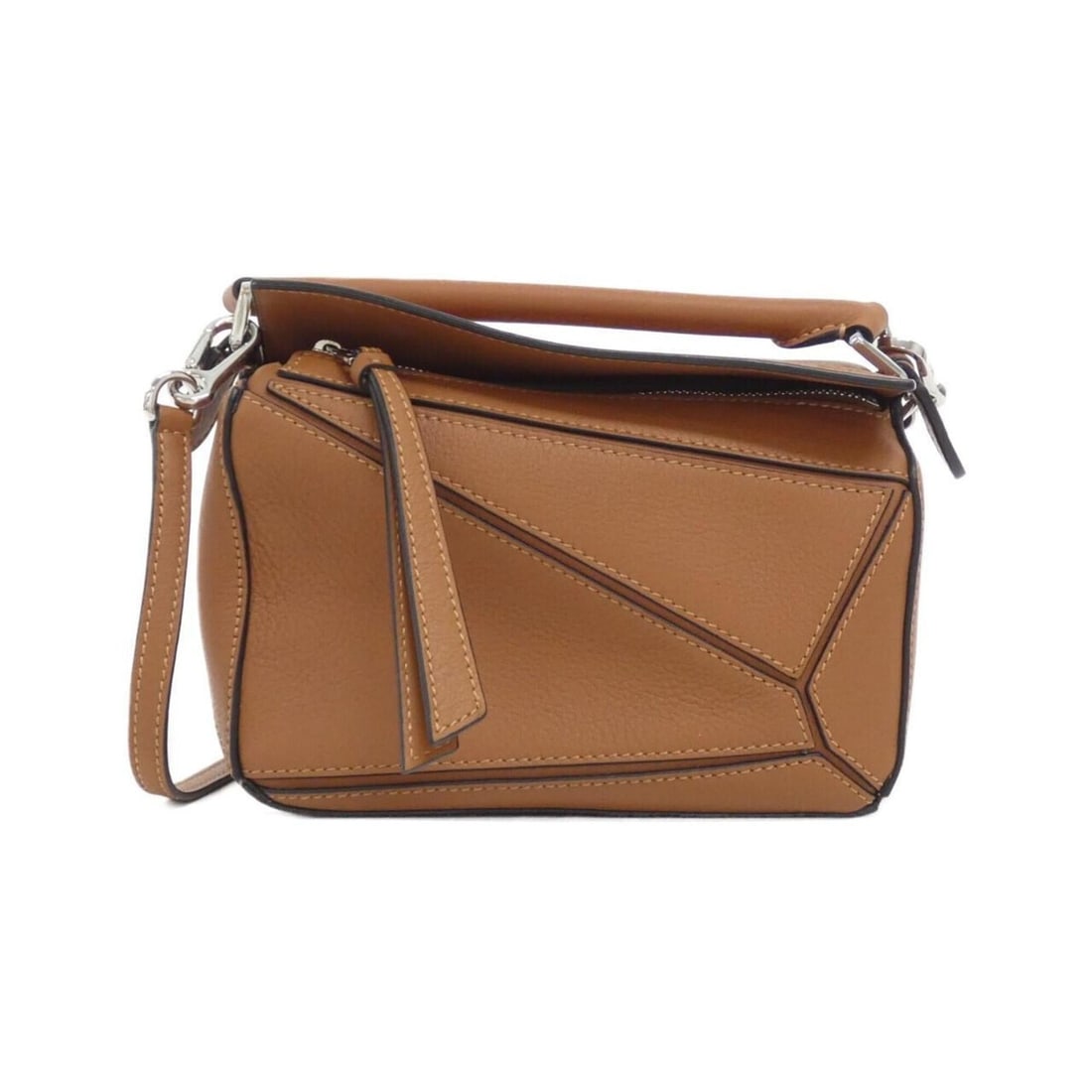 Loewe Puzzle Mini 322 30 U95 Handbag: --- Catalog ---Category: SizeSize (HxWxD): 11cm x 17cm x 7cm / 4.33'' x 6.69'' x 2.75''Category: DesignType: HandbagColor: BrownGender: Women,MenMaterial: Leather Leather/Fur Type: CalfskinCategory: