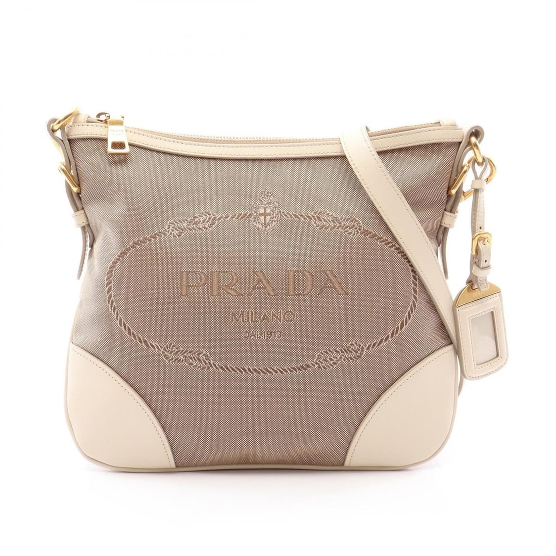 Prada LOGO JACQUARD Shoulder Bag/Handbag, Canvas and Leather, Women's, Beige/Ivory: --- Catalog ---Category: SizeSize (HxWxD): 23cm x 27.5cm x 6.5cm / 9.05'' x 10.82'' x 2.55''Strap Length: 111cm - 121cm / 43.7'' - 47.63''Category: DesignType: Shoulder bagColor: Beige, IvoryGender: W