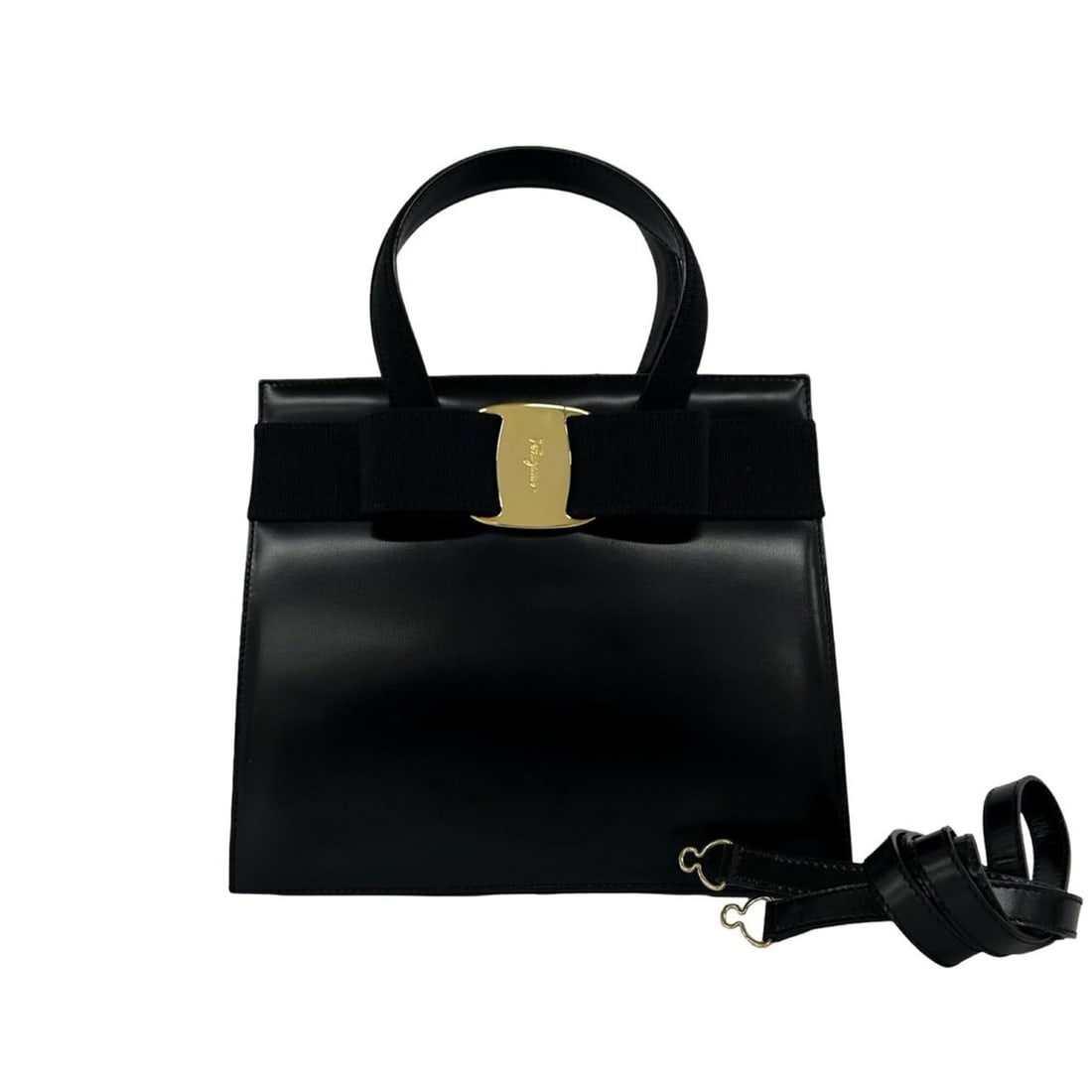 Salvatore Ferragamo Vara Ribbon Leather 2-way Shoulder Bag/Handbag Black 21079: --- Catalog ---Category: SizeSize (HxWxD): 21cm x 24.5cm x 9.5cm / 8.26'' x 9.64'' x 3.74''Category: DesignType: Handbag, Shoulder bagColor: BlackGender: WomenMaterial: Leather Category: GeneralBrand: