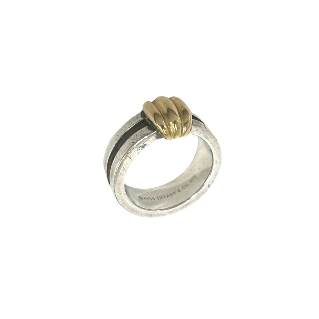 TIFFANY&Co. Tiffany Grooved With Ring, Sterling Silver 925, 18K Yellow Gold 750YG, Item Number 29876: --- Catalog ---Category: SizeJP Size: 13US Size: 6.5Category: DesignType: Band ringColor: Gold, SilverGender: WomenMaterial: Silver 925, Yellow gold (18K)Category: GeneralBrand: Tiffany--- Item List -