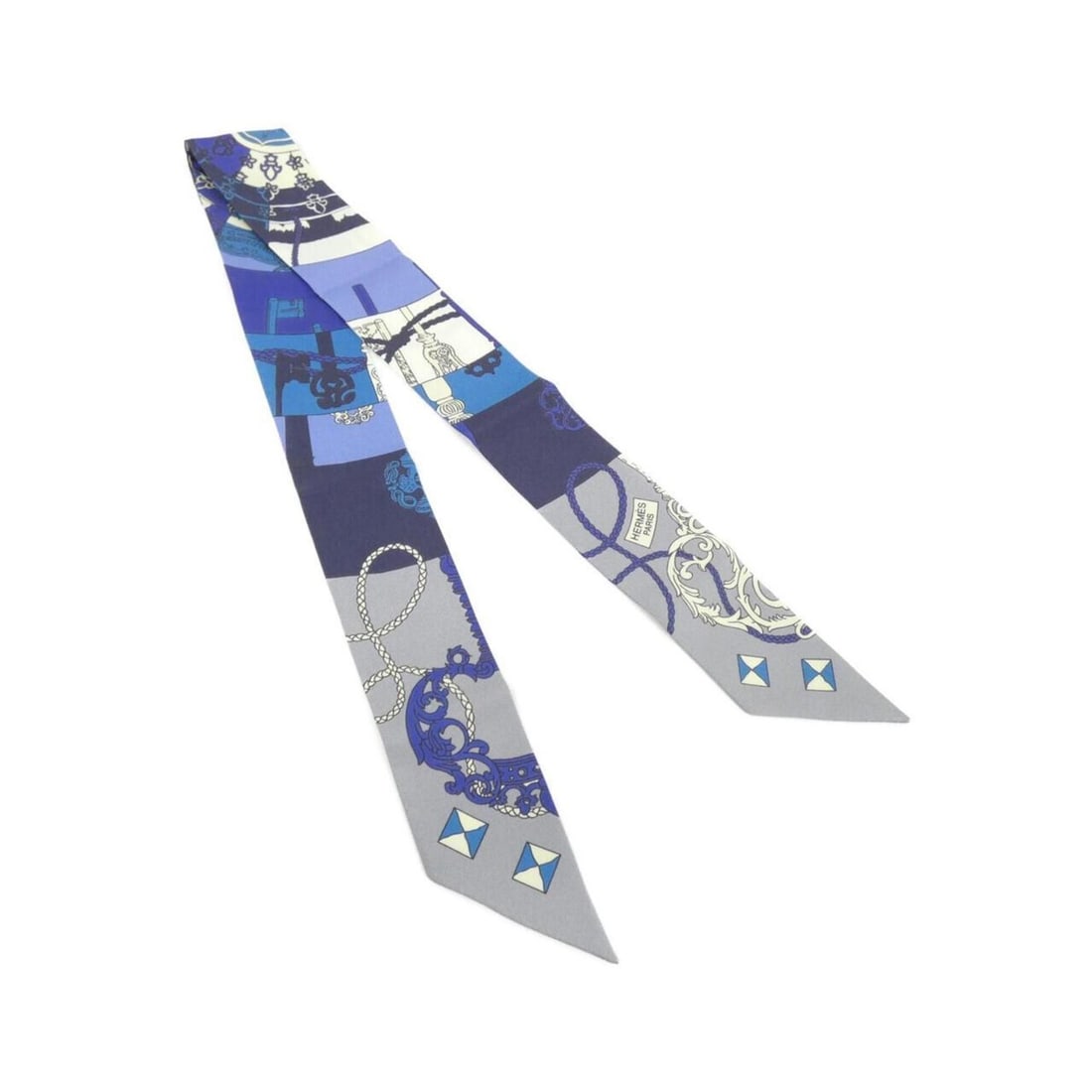 Hermes TOURS DE CIES Twilly Scarf Muffler: --- Catalog ---Category: SizeSize (LxW): 5cm x 86cm / 1.96'' x 33.85''Category: DesignType: ScarfColor: BlueGender: Women,MenMaterial: Silk Category: GeneralBrand: Hermes--- Item List ---Section: Cond