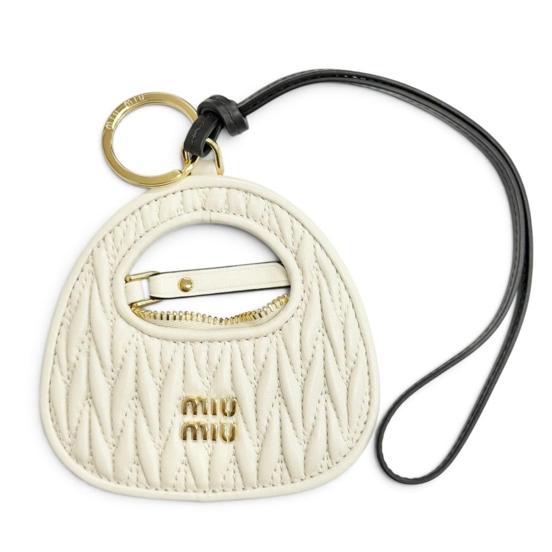 Miu Miu MIUMIU 5TL3572 Leather Wonder Keychain Bag Charm, Ivory, Black, Gold Hardware, Women's: --- Catalog ---Category: SizeSize (HxWxD): 11cm x 10.2cm / 4.33'' x 4.01''Category: DesignType: KeyringColor: Black, IvoryGender: WomenMaterial: LeatherCategory: GeneralMPN: 5TL3572Brand: Miu Miu--- I