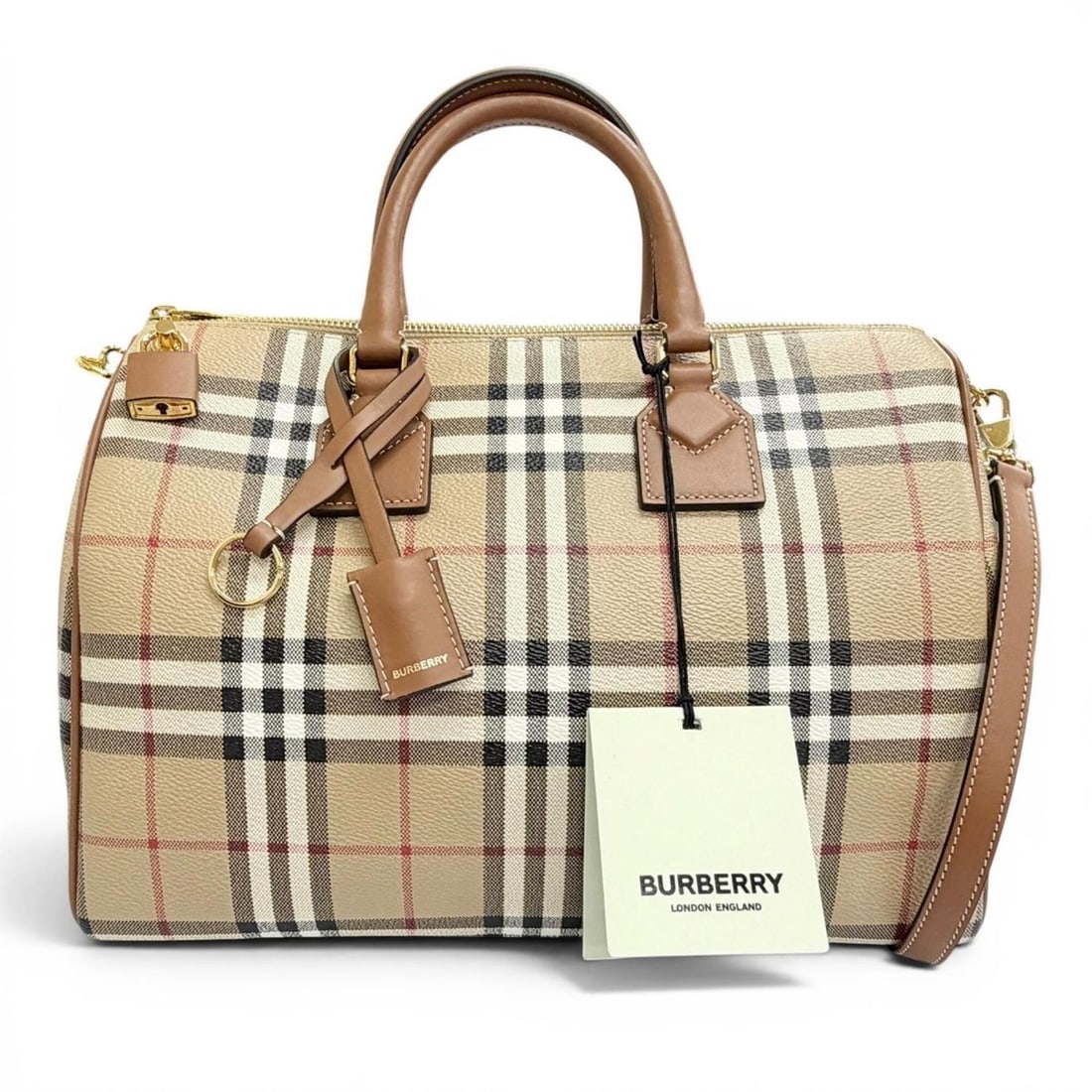 Burberrys 8071355 Medium Bowling Nova Check Pattern Leather Trim 2-Way Boston Bag/Shoulder Bag Beige: --- Catalog ---Category: SizeSize (HxWxD): 21.5cm x 32.5cm x 15cm / 8.46'' x 12.79'' x 5.9''Category: DesignType: Boston bag, Shoulder bagColor: Beige, BrownGender: WomenMaterial: Leather , Cotton , E