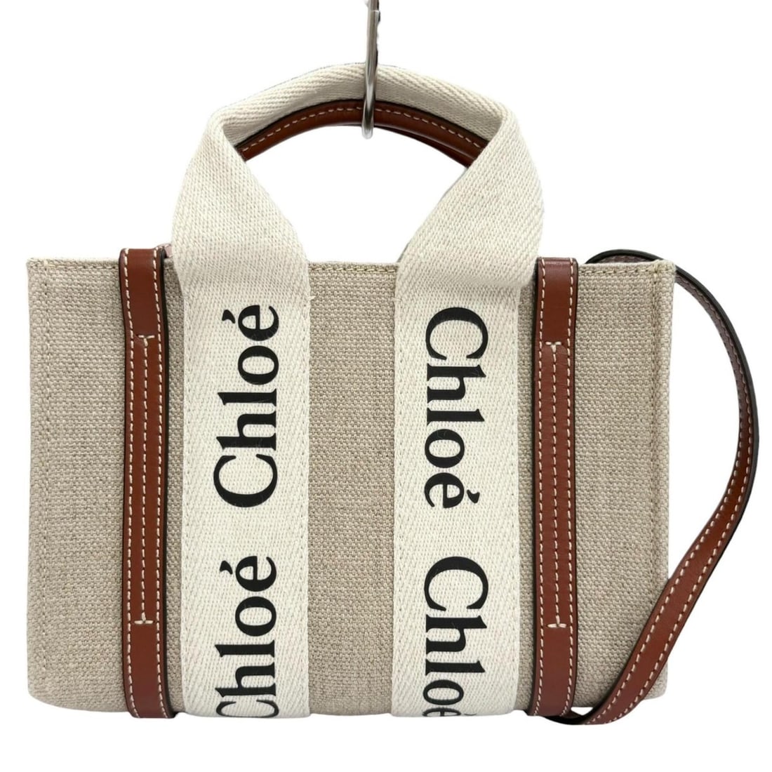 Chloé Chloe CHC22AP237I2690U Woody Mini Tote Bag, Linen and Calf Leather, Logo Shoulder: --- Catalog ---Category: SizeSize (HxWxD): 14cm x 20cm x 4cm / 5.51'' x 7.87'' x 1.57''Category: DesignType: Shoulder bag, Tote bagColor: Beige, BrownGender: WomenMaterial: Linen , Leather Category: G