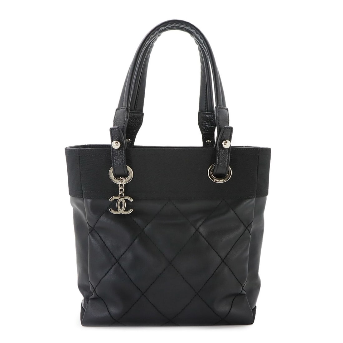 Chanel Paris Biarritz PM Tote Handbag, Nylon and Leather, Black, A34208, Silver Hardware: --- Catalog ---Category: SizeSize (HxWxD): 27cm x 25cm x 11cm / 10.62'' x 9.84'' x 4.33''Category: DesignType: Handbag, Tote bagColor: BlackGender: WomenMaterial: Nylon , PVC , Leather Hardware Color: