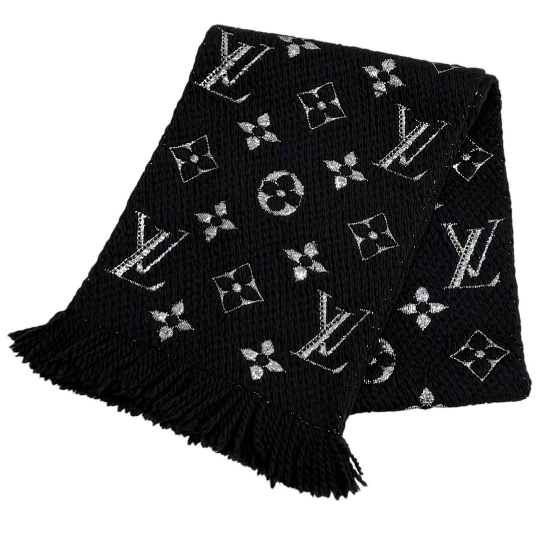 LOUIS VUITTON M75833 Echarpe Logomania Shine Wool Silk Blend Stole Scarf Black Silver Made in Italy: --- Catalog ---Category: SizeSize (LxW): 1.54m x 28.5cm / 60.62'' x 11.22''Category: DesignType: StoleColor: Black, SilverGender: WomenMaterial: Wool , Silk , Polyester Category: GeneralBrand: Louis V