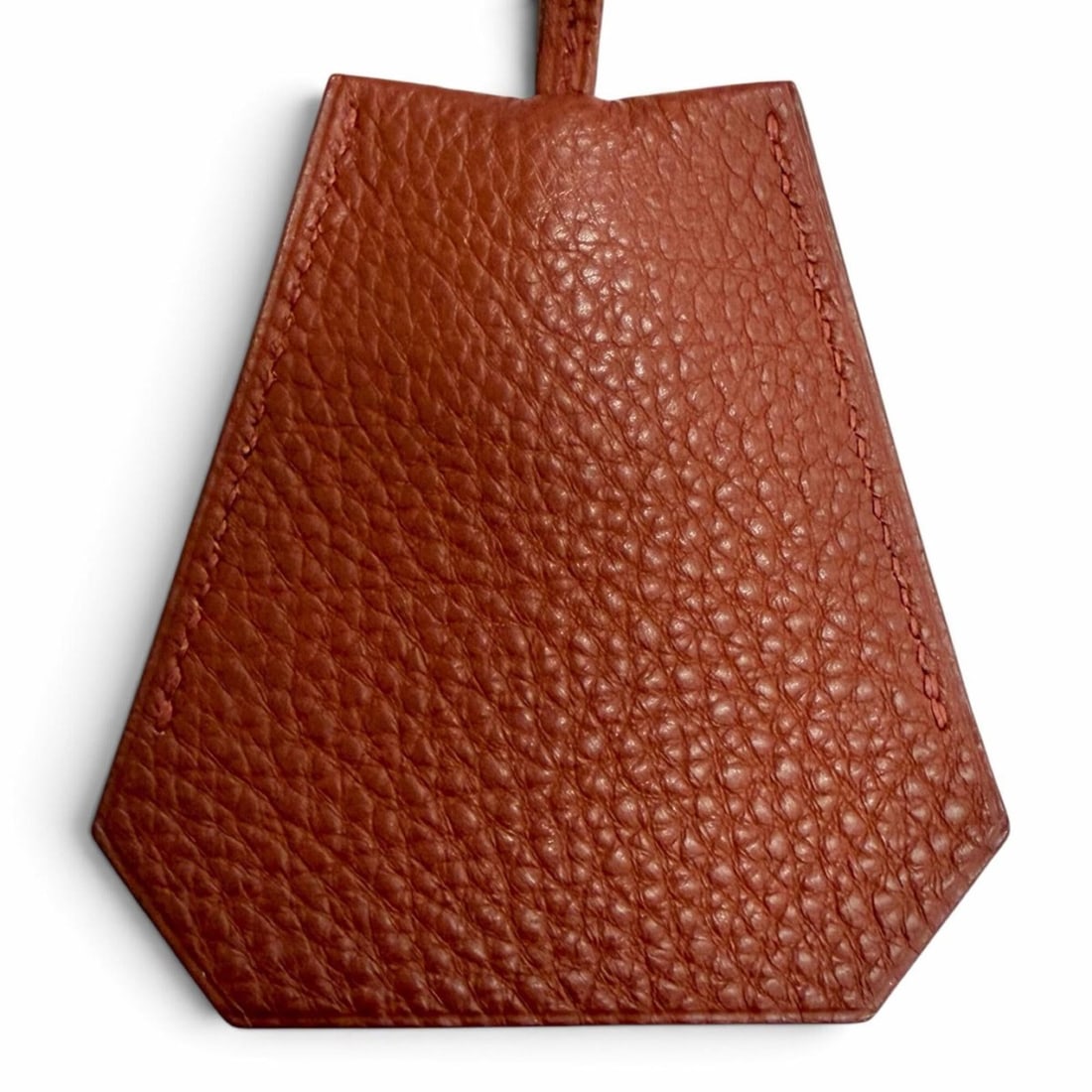 HERMES Vintage Togo Brick Silver Hardware Margiela Era Clochette Necklace Brown ?D Stamp Made in: --- Catalog ---Category: SizePendant Size: 80mm x 78mm / 3.14'' x 3.07''Neck Circumference: 98 cm / 38.58''Category: DesignColor: Brique, BrownGender: Men,WomenMaterial: Togo leatherNecklace Type: Nec