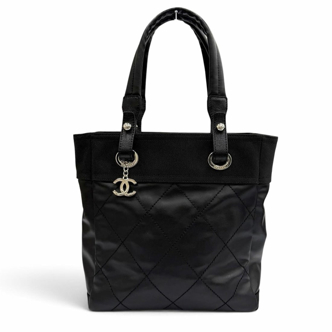CHANEL A34208 Paris Biarritz PM Coco Mark Leather Trim Coated Canvas Tote Bag Black Silver Hardware: --- Catalog ---Category: SizeSize (HxWxD): 26.5cm x 30cm x 10.5cm / 10.43'' x 11.81'' x 4.13''Category: DesignType: Tote bagColor: BlackGender: WomenMaterial: Coated canvas , Leather Hardware Color: S