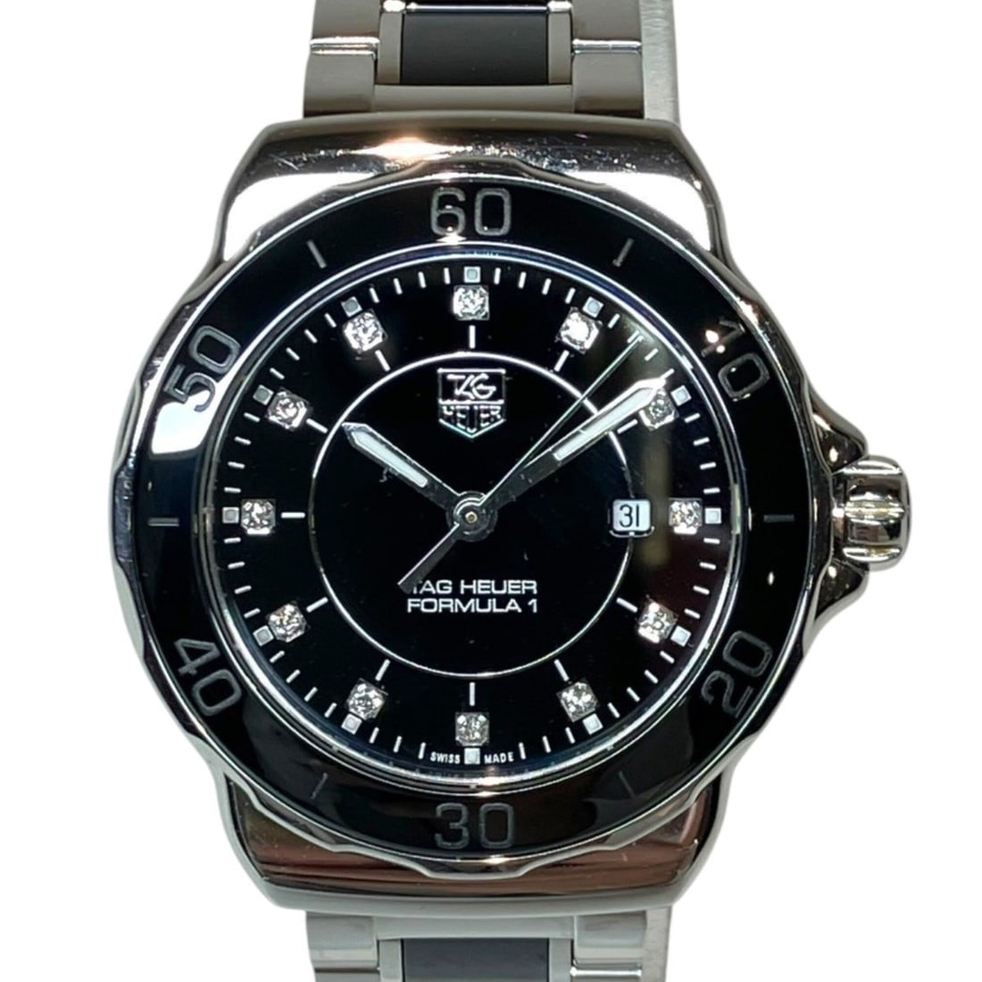 TAG Heuer Formula 1 32mm Watch, Total Weight 85g, Stainless Steel, Quartz Movement, Black Dial,: --- Catalog ---Category: SizeWrist Size: 15.5cm / 6.1''Case Diameter: 32mm / 1.26''Category: DesignType: WristwatchGender: WomenColor (Dial): BlackMaterial (Band): Stainless steelMaterial (Case): Stai