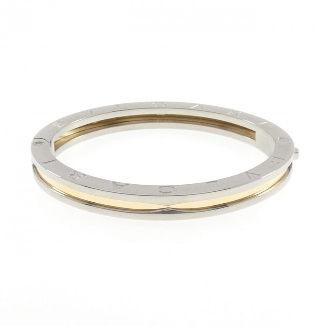 Bvlgari B.zero1 Bangle: --- Catalog ---Category: SizeLength: 16cm / 6.29''Category: DesignType: BangleGender: Women,MenMaterial: Stainless steel, Yellow gold (18K)Category: GeneralMPN: BR851334Brand: Bvlgari--- Item List ---
