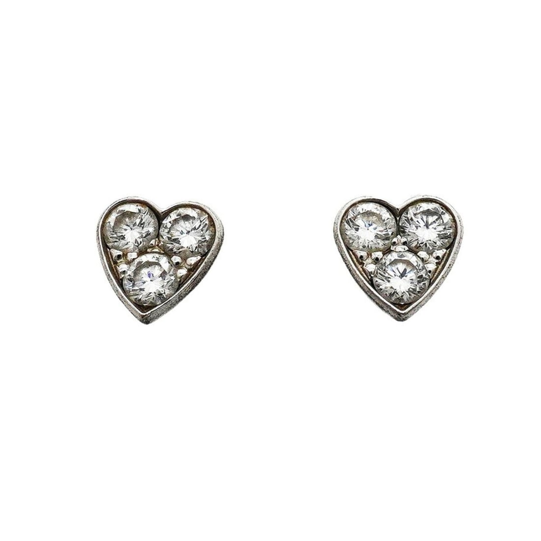 Cartier Mini Heart Earrings, 18K White Gold, Diamond, Women's: --- Catalog ---Category: SizeSize (HxWxD): 6.00mm x 6.00mm / 0.24'' x 0.24''Category: DesignType: Stud earringsStone: DiamondGender: WomenMaterial: White gold (18K)Category: GeneralBrand: Cartier--- I