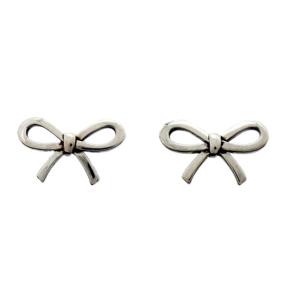 Tiffany & Co. Bow Ribbon Earrings, Sterling Silver 925, Women's: --- Catalog ---Category: SizeSize (HxWxD): 8.50mm x 13.60mm / 0.33'' x 0.54''Category: DesignType: Stud earringsGender: WomenMaterial: Silver 925Category: GeneralBrand: Tiffany--- Item List