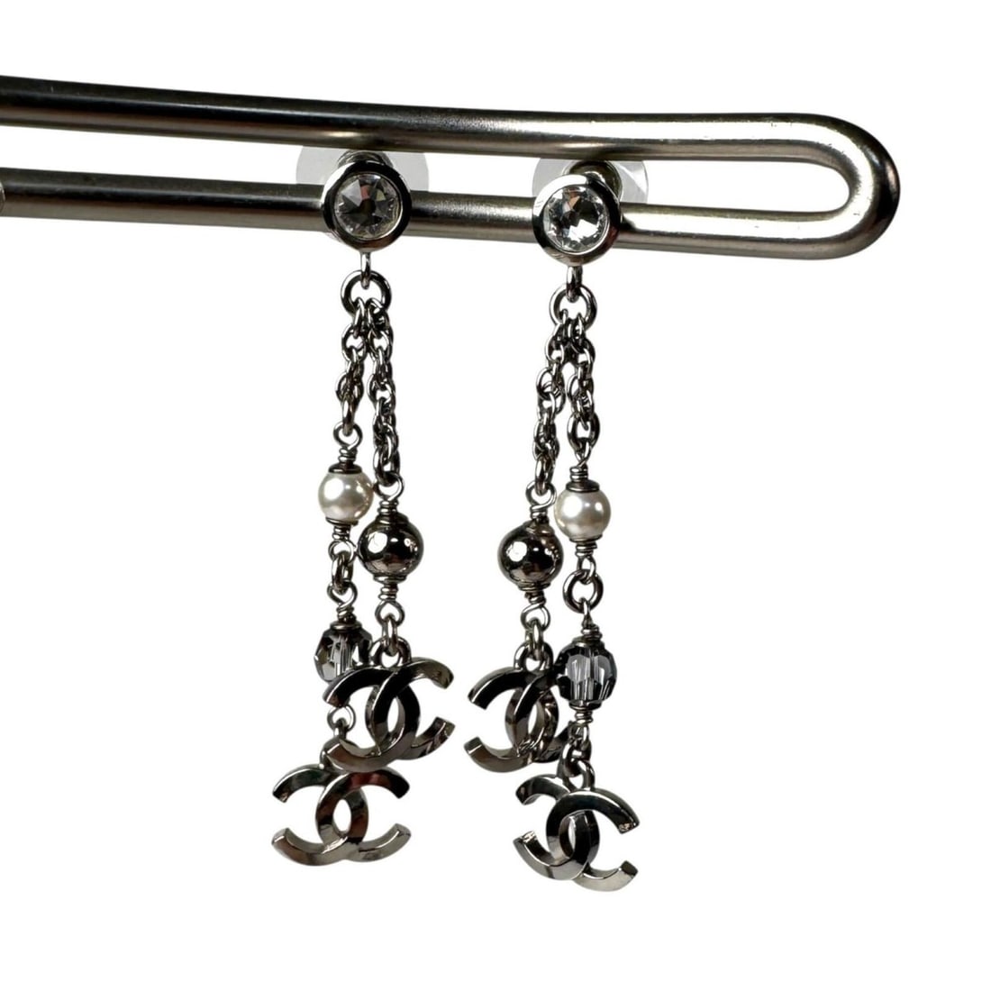 Chanel Coco Mark Long Drop Earrings (Pair) with Rhinestones and Pearls, C24K Gold, for Women: --- Catalog ---Category: SizeSize (HxWxD): 60.00mm x 12.00mm / 2.36'' x 0.47''Category: DesignType: Stud earringsColor: SilverGender: WomenMaterial: Metal, RhinestoneCategory: GeneralBrand: Chanel--- 