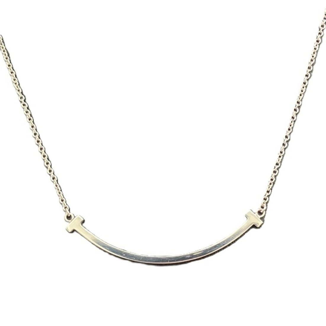 Tiffany & Co. T Smile 750WG 45cm Necklace White Gold: --- Catalog ---Category: SizeNeck Circumference: 36 cm - 40 cm / 14.17'' - 15.74''Category: DesignColor: White goldGender: WomenMaterial: White gold (18K)Necklace Type: NecklaceCategory: GeneralLine: