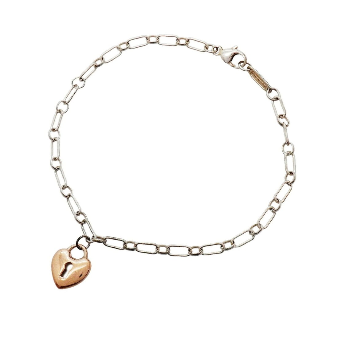 Tiffany & Co. Heart Lock Bracelet, 18K Pink Gold, Sterling Silver 925, Women's: --- Catalog ---Category: SizeLength: 17cm / 6.69''Category: DesignType: Charm braceletGender: WomenMaterial: Pink gold (18K), Silver 925Category: GeneralBrand: Tiffany--- Item List ---Section: Conditi