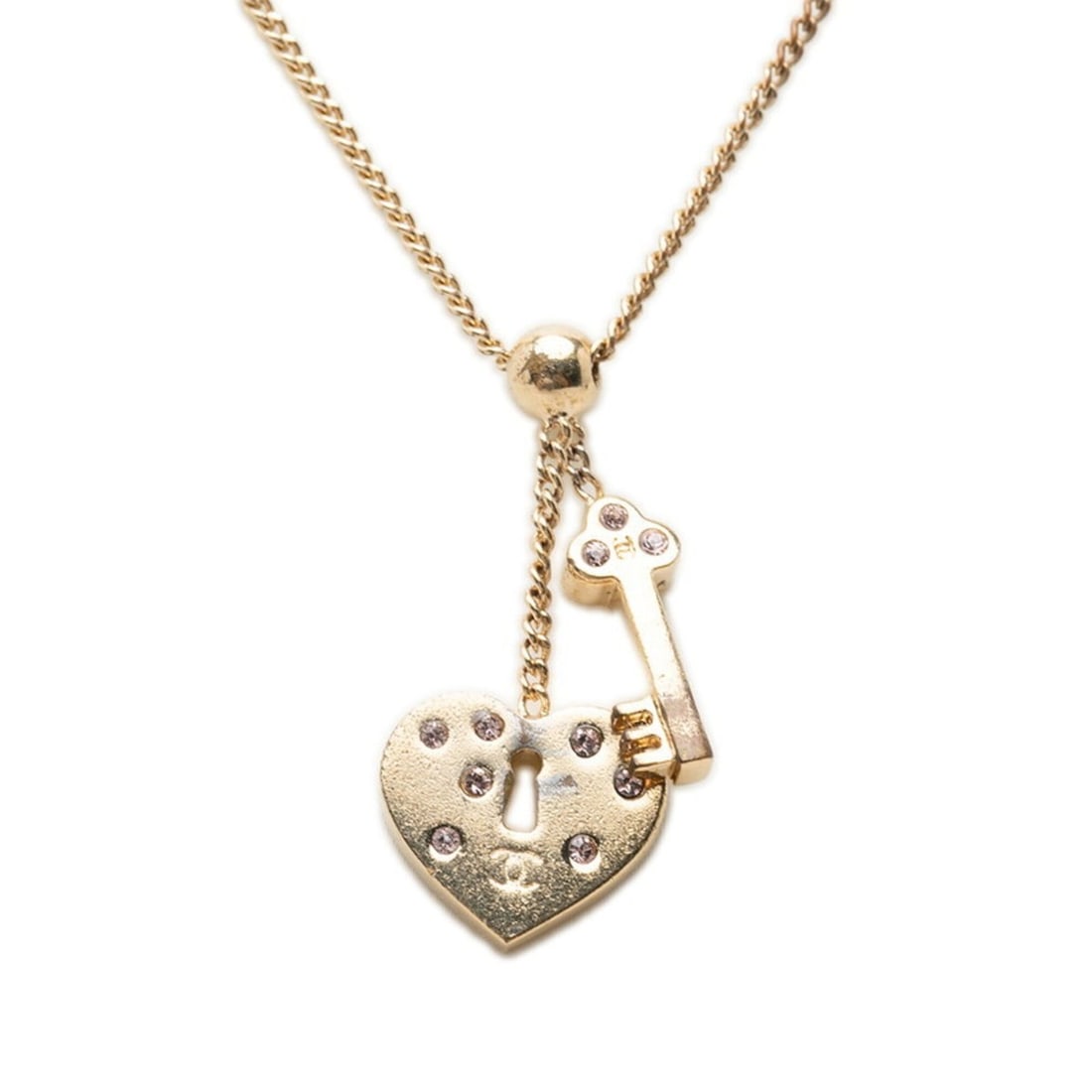 Chanel Coco Mark Heart Key Chain Pendant Necklace, 02P Engraving, Gold Plated Rhinestone, Women's: --- Catalog ---Category: SizePendant Size: 34mm x 15.2mm / 1.33'' x 0.59''Neck Circumference: 46 cm / 18.11''Category: DesignColor: GoldGender: WomenMaterial: RhinestoneNecklace Type: NecklaceCategory