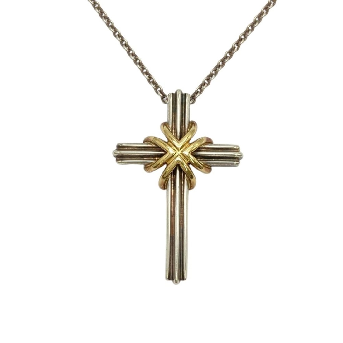 Tiffany & Co. Signature Cross Pendant Necklace, SV925 (Sterling Silver), 8.1g, 18K Yellow Gold: --- Catalog ---Category: SizePendant Size: 22mm x 33mm / 0.86'' x 1.29''Neck Circumference: 46 cm / 18.11''Category: DesignColor: SilverGender: WomenMaterial: Silver 925Necklace Type: Pendant necklace