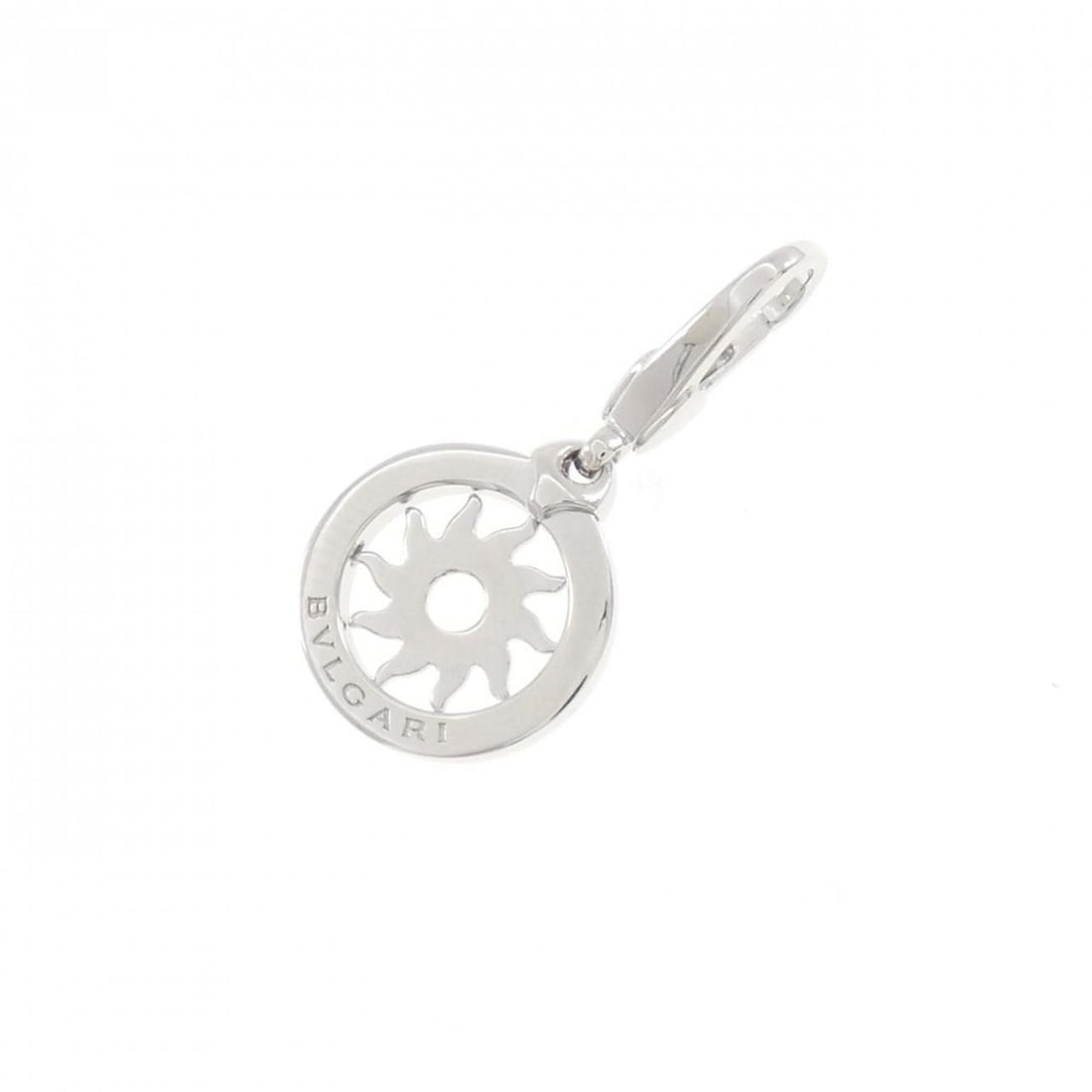Bvlgari Tondo Sun Charm: --- Catalog ---Category: SizePendant Size: 29.5mm x 14.4mm / 1.16'' x 0.56''Category: DesignColor: White goldGender: WomenMaterial: White gold (18K)Necklace Type: PendantCategory: GeneralBrand: