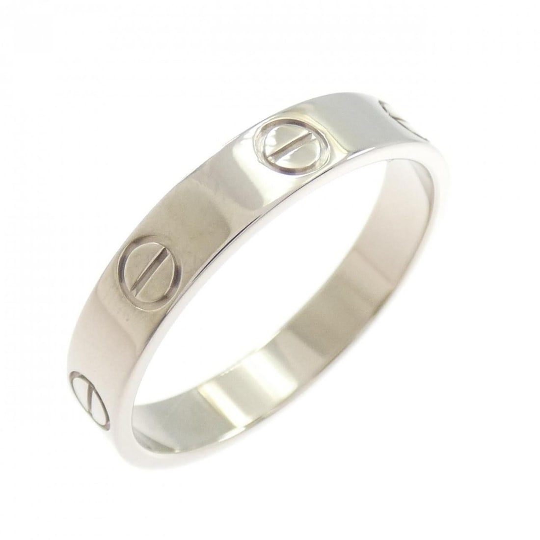 Cartier Mini Love Ring: --- Catalog ---Category: SizeJP Size: 14US Size: 7Category: DesignType: Band ringGender: WomenMaterial: White gold (18K)Category: GeneralLine: LoveBrand: Cartier--- Item List ---Section: