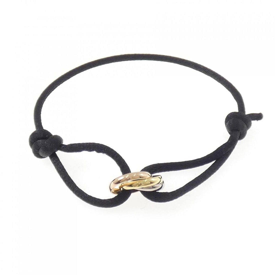 Cartier Trinity Cord Bracelet: --- Catalog ---Category: DesignType: Charm braceletGender: WomenMaterial: Pink gold (18K), White gold (18K), Yellow gold (18K)Category: GeneralBrand: Cartier--- Item List ---Section: ConditionRanking: