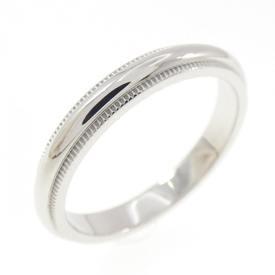 Tiffany & Co. Milgrain Ring: --- Catalog ---Category: SizeJP Size: 13.5US Size: 6.5Category: DesignType: Band ringGender: WomenMaterial: Platinum 950Category: GeneralBrand: Tiffany--- Item List ---Section: ConditionRanking: Rank