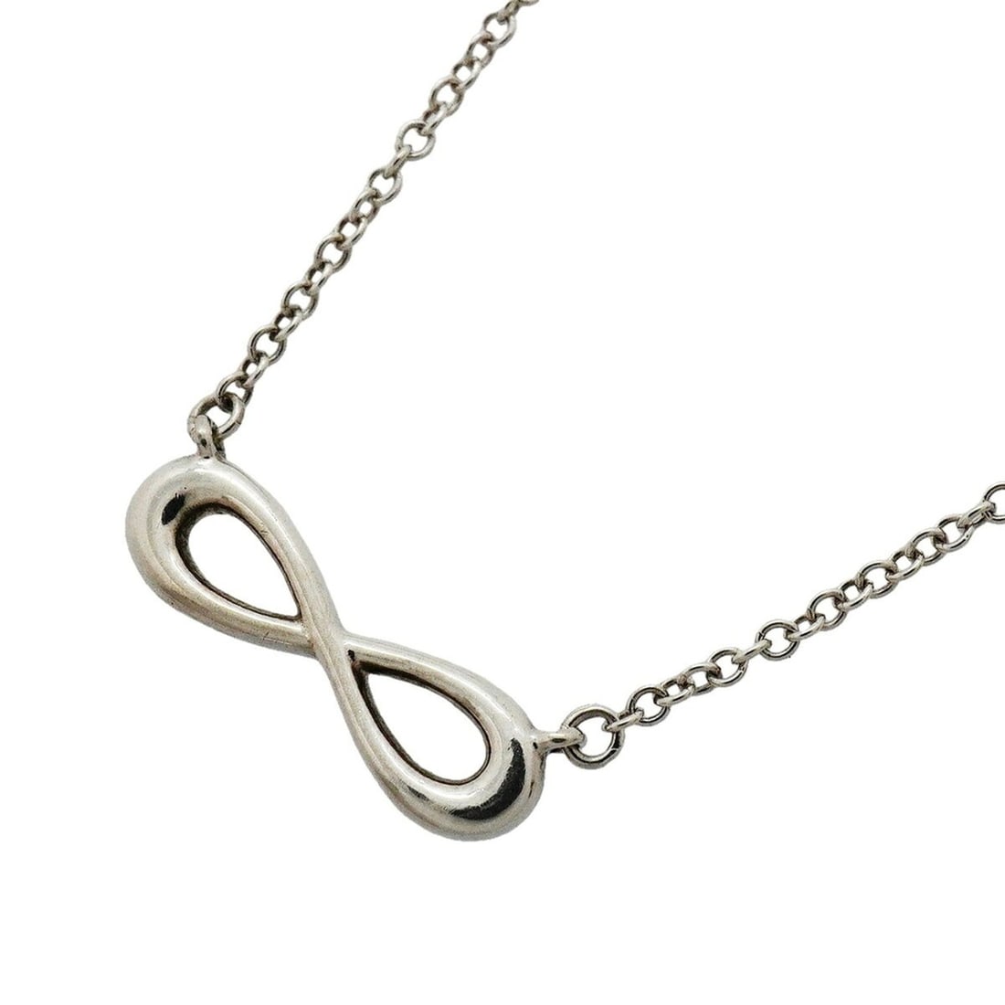 Tiffany & Co. Infinity Necklace, Sterling Silver 925, Women's: --- Catalog ---Category: SizePendant Size: 4.8mm x 14.4mm / 0.18'' x 0.56''Neck Circumference: 41 cm - 46.5 cm / 16.14'' - 18.3''Category: DesignGender: WomenMaterial: Silver 925Necklace Type: