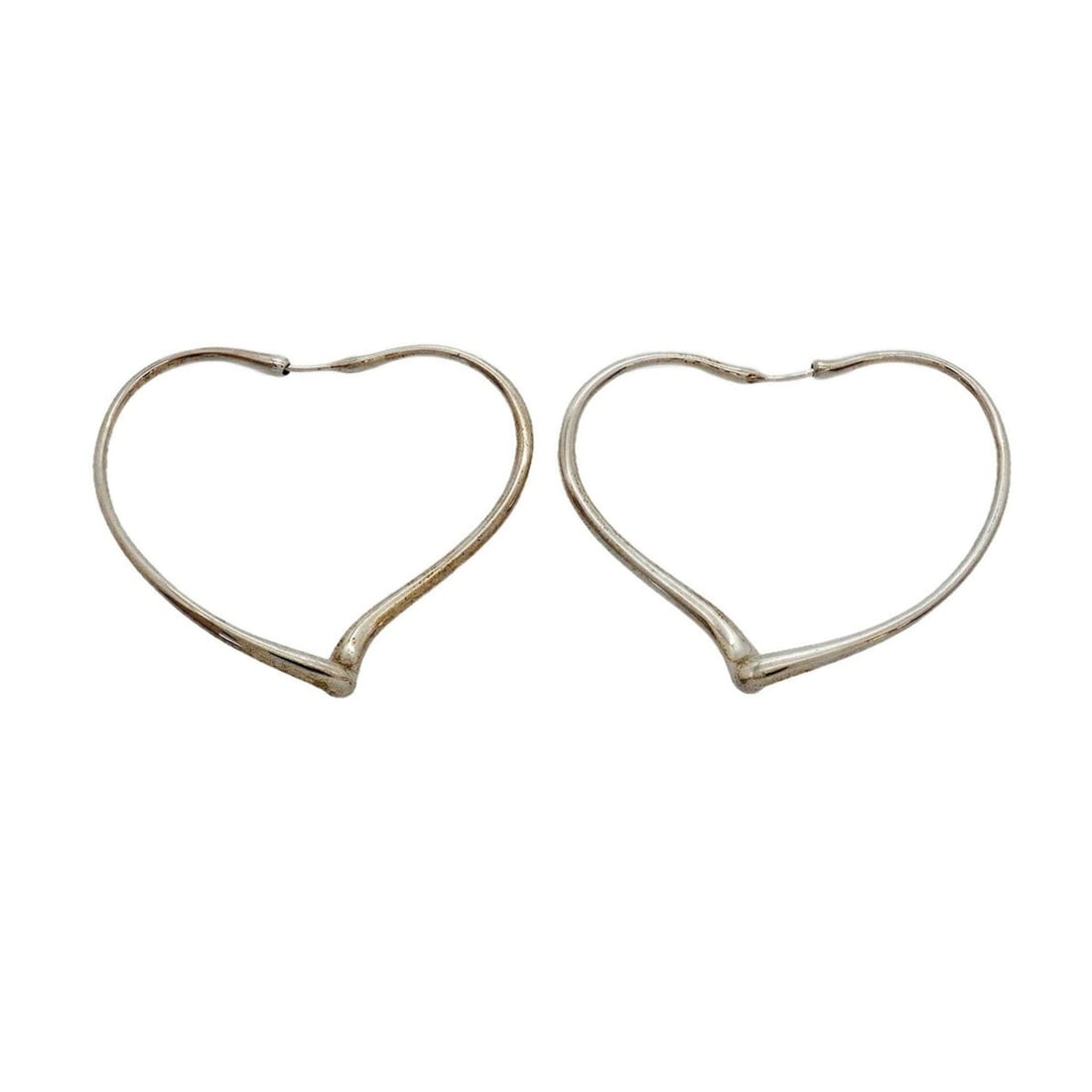 Tiffany & Co. Heart Sterling Silver 925 Earrings for Women: --- Catalog ---Category: SizeSize (HxWxD): 41.10mm x 2.40mm / 1.62'' x 0.09''Category: DesignType: Stud earringsGender: WomenMaterial: Silver 925Category: GeneralBrand: Tiffany--- Item List