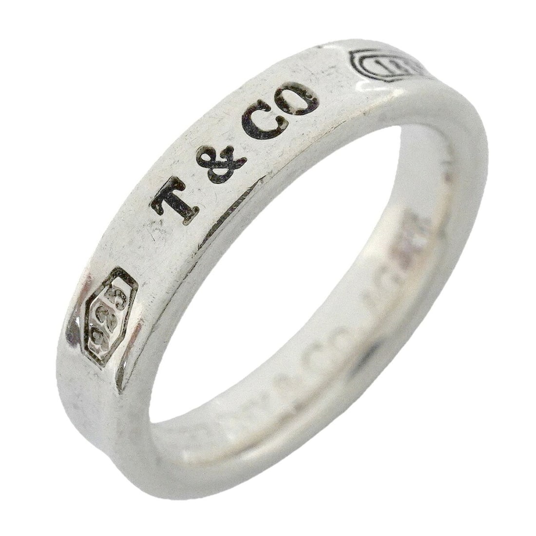 Tiffany & Co. Narrow Ring, Sterling Silver 925, Size 9, Women's: --- Catalog ---Category: SizeJP Size: 9US Size: 5Category: DesignType: Band ringGender: WomenMaterial: Silver 925Category: GeneralBrand: Tiffany--- Item List ---Section: ConditionRanking: Rank AB Used